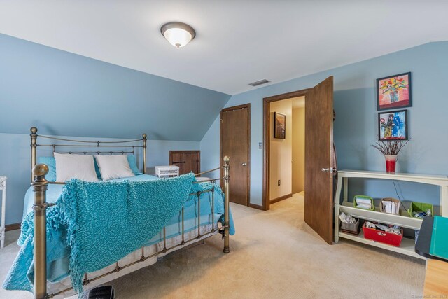 19 Edgewood St, Cromwell, CT 06416 - carpeted bedroom featuring vaulted ceiling