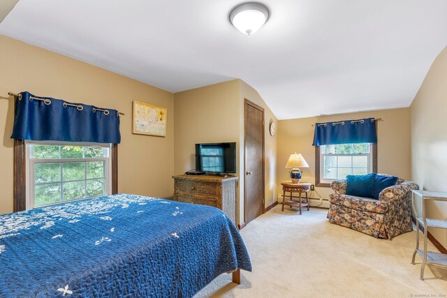 19 Edgewood St, Cromwell, CT 06416 - carpeted bedroom with baseboard heating, lofted ceiling, and baseboards