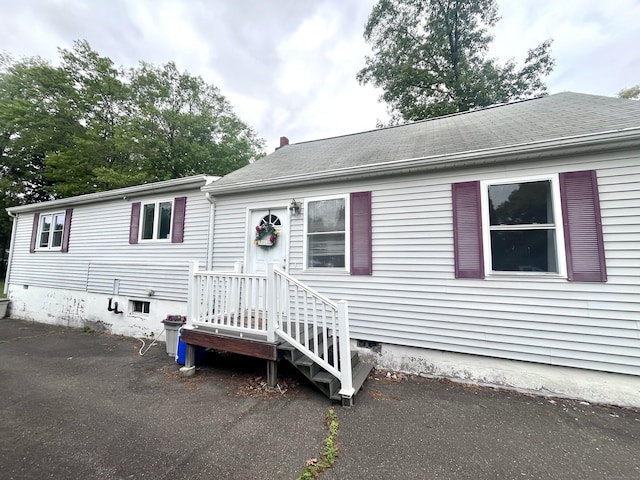 view of front of house featuring crawl space