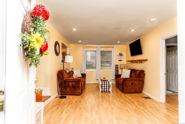 40 Woodland Ave, North Haven, CT 06473 - sitting room with light wood-type flooring and recessed lighting