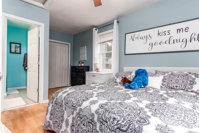 40 Woodland Ave, North Haven, CT 06473 - bedroom with wood finished floors, a closet, and a ceiling fan