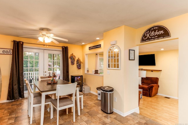 40 Woodland Ave, North Haven, CT 06473 - dining room with ceiling fan, french doors, light stone finish floors, and recessed lighting