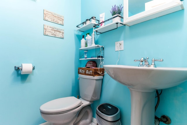 40 Woodland Ave, North Haven, CT 06473 - bathroom with toilet and baseboards