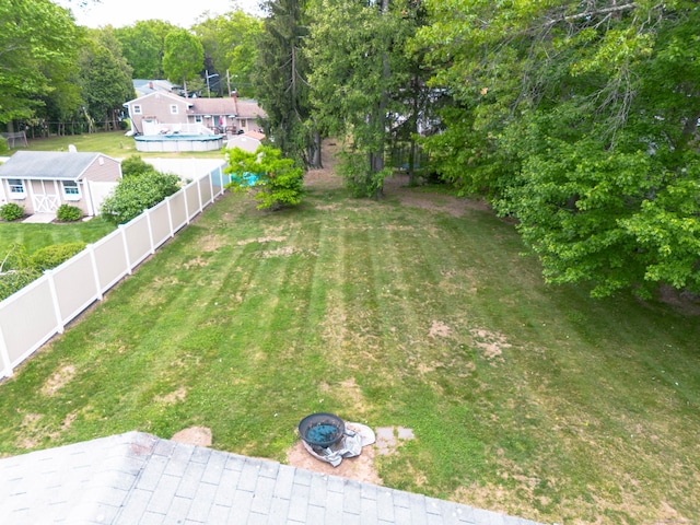 40 Woodland Ave, North Haven, CT 06473 - fenced backyard with a fire pit