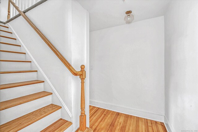 61 Reed St, Stratford, CT 06614 - stairway with wood finished floors and baseboards