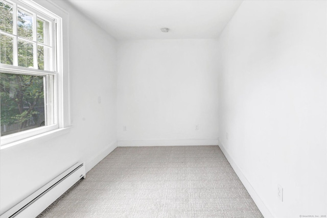 61 Reed St, Stratford, CT 06614 - spare room featuring baseboard heating, carpet flooring, a smoke detector, and baseboards