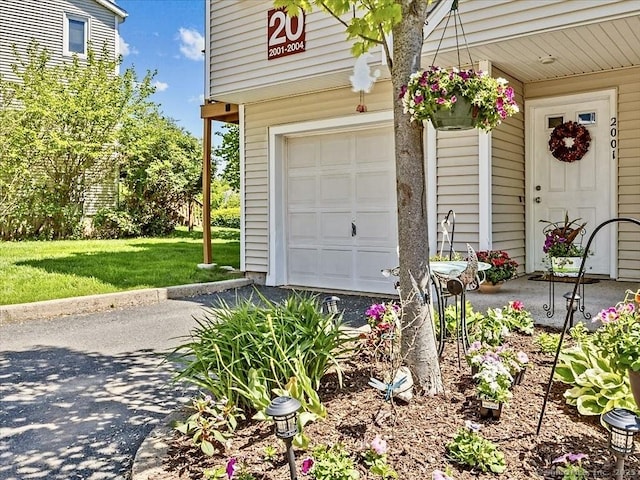158 Paddock Ave Apt 2001, Meriden, CT 06450 - garage featuring asphalt driveway