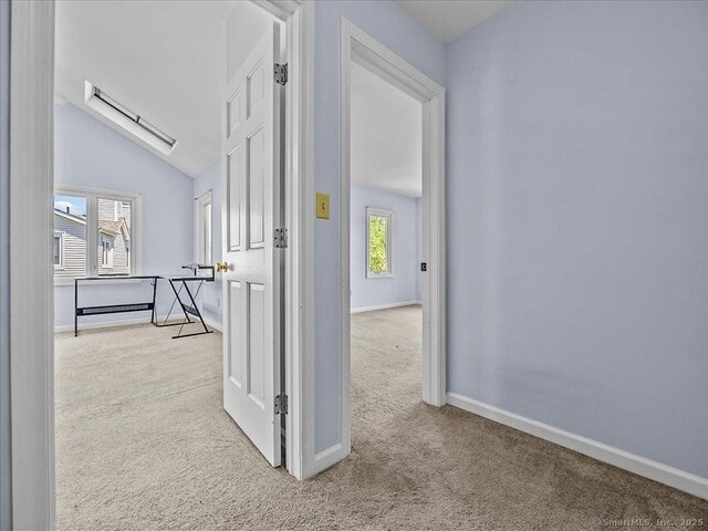 158 Paddock Ave Apt 2001, Meriden, CT 06450 - corridor featuring carpet floors, baseboards, and lofted ceiling