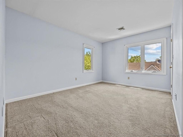 158 Paddock Ave Apt 2001, Meriden, CT 06450 - unfurnished room featuring carpet, healthy amount of natural light, and baseboards