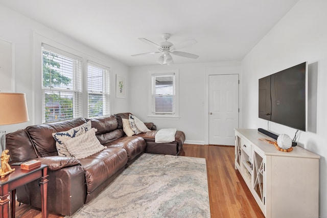26 Longfellow Ave, Fairfield, CT 06825 - living room featuring plenty of natural light, a ceiling fan, wood finished floors, and baseboards