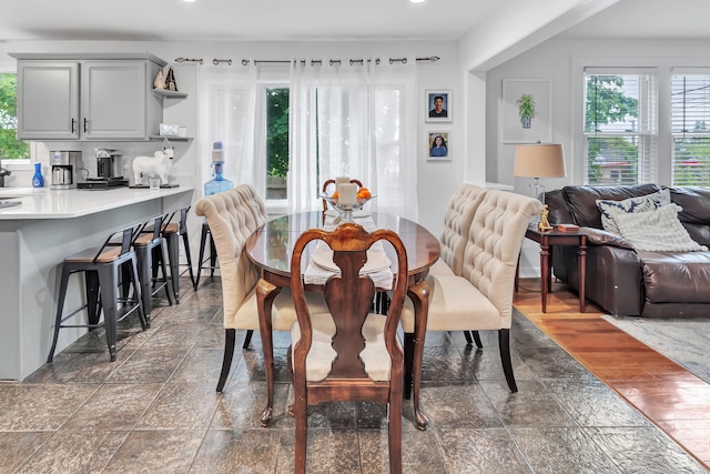 26 Longfellow Ave, Fairfield, CT 06825 - dining space featuring healthy amount of natural light, stone tile flooring, and recessed lighting