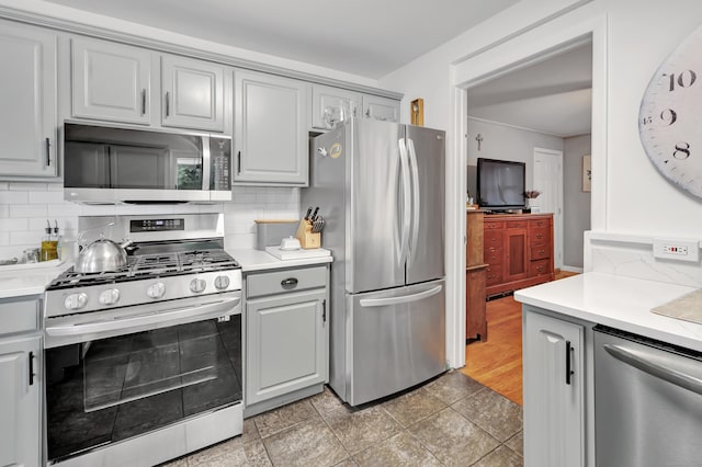 26 Longfellow Ave, Fairfield, CT 06825 - kitchen featuring stainless steel appliances, gray cabinetry, and light countertops