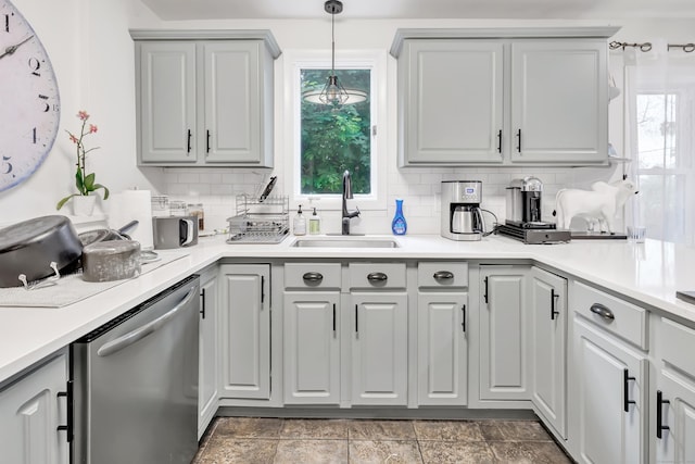 26 Longfellow Ave, Fairfield, CT 06825 - kitchen featuring a sink, dishwasher, gray cabinets, and backsplash