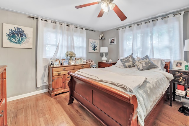 26 Longfellow Ave, Fairfield, CT 06825 - bedroom featuring multiple windows, light wood-style floors, baseboards, and a ceiling fan