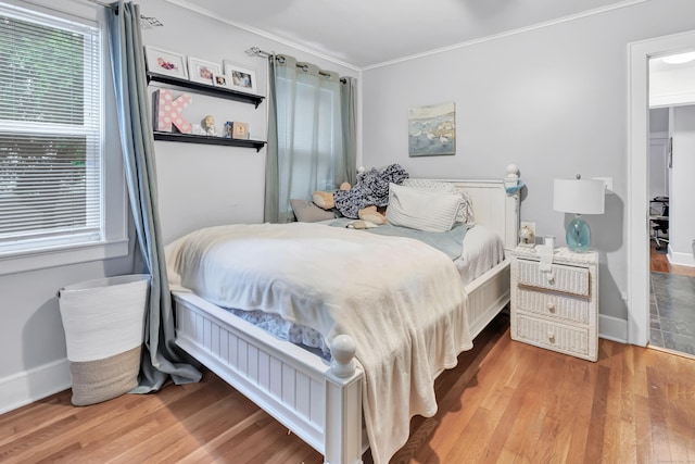 26 Longfellow Ave, Fairfield, CT 06825 - bedroom featuring wood finished floors, crown molding, and baseboards