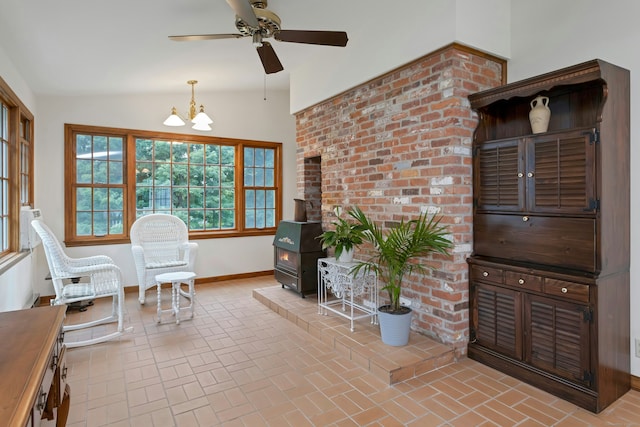 130 Haviland Rd, Ridgefield, CT 06877 - sunroom / solarium with vaulted ceiling, a chandelier, a wood stove, and french doors