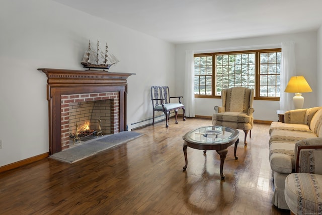 130 Haviland Rd, Ridgefield, CT 06877 - living room with wood finished floors, a fireplace, and baseboard heating