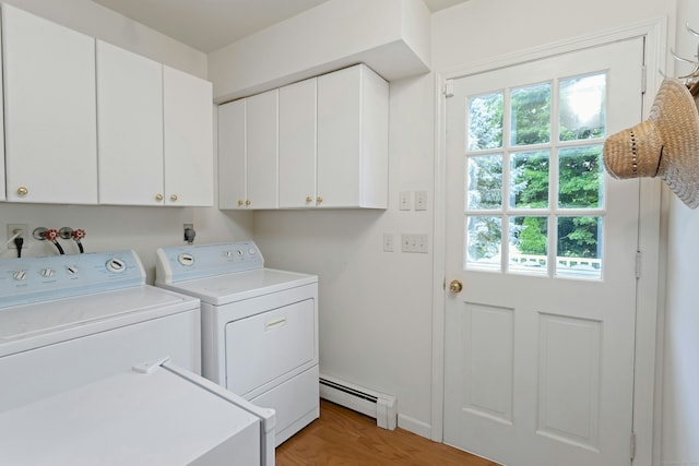 130 Haviland Rd, Ridgefield, CT 06877 - laundry area with baseboard heating, washer and clothes dryer, plenty of natural light, and cabinet space