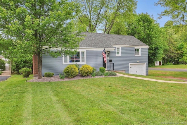 184 Goodale Dr, Newington, CT 06111 - view of front of house featuring driveway, a garage, and a front yard