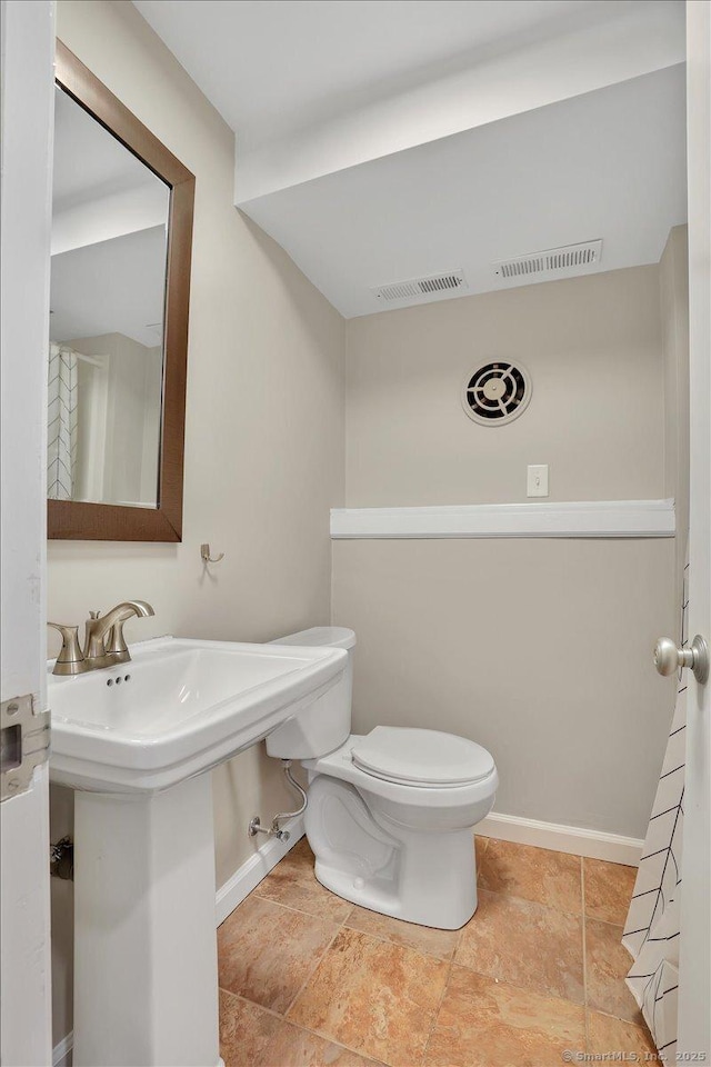 184 Goodale Dr, Newington, CT 06111 - bathroom with toilet and baseboards