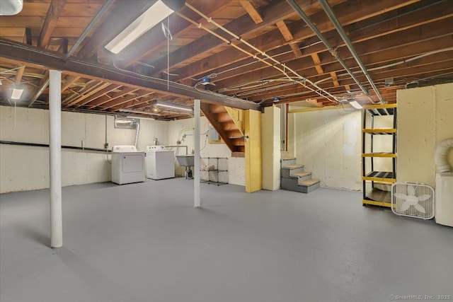184 Goodale Dr, Newington, CT 06111 - unfinished below grade area featuring washing machine and dryer, stairs, and a sink
