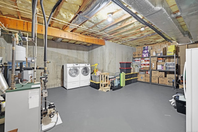 12 Everwood Dr, New Milford, CT 06776 - unfinished basement featuring washer and dryer and a heating unit