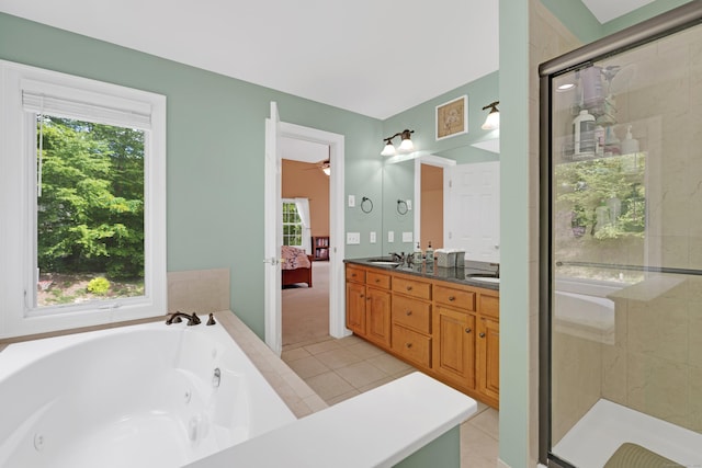 12 Everwood Dr, New Milford, CT 06776 - ensuite bathroom with a whirlpool tub, double vanity, a stall shower, tile patterned floors, and a ceiling fan