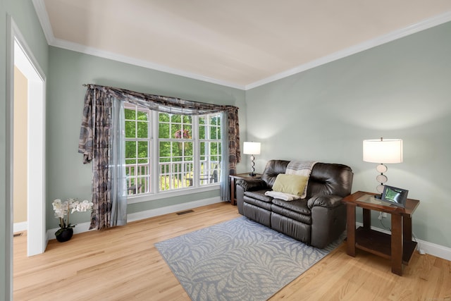 12 Everwood Dr, New Milford, CT 06776 - living area with baseboards, wood finished floors, and ornamental molding