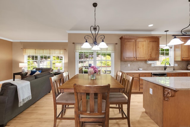 12 Everwood Dr, New Milford, CT 06776 - dining area with light wood finished floors, a chandelier, ornamental molding, and recessed lighting