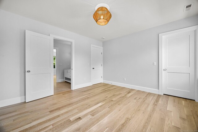 171 Compo Rd S, Westport, CT 06880 - unfurnished bedroom featuring light wood finished floors and baseboards