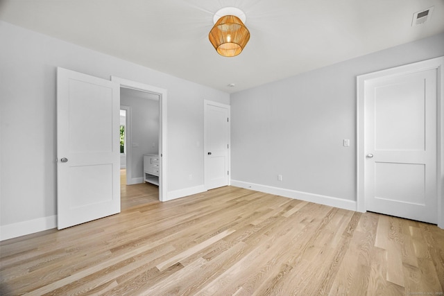 171 Compo Rd S, Westport, CT 06880 - unfurnished bedroom featuring light wood-type flooring and baseboards