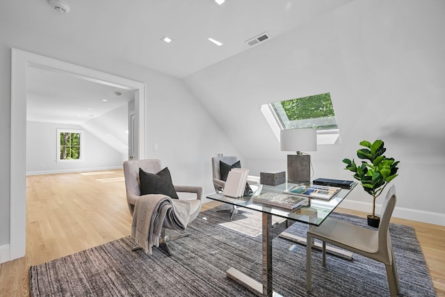 171 Compo Rd S, Westport, CT 06880 - home office with a skylight, lofted ceiling, wood finished floors, and baseboards