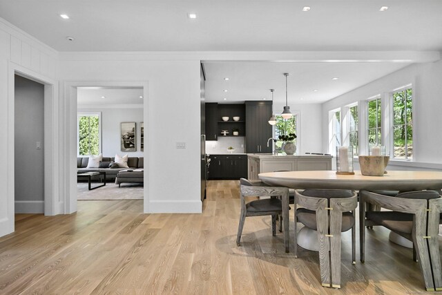 171 Compo Rd S, Westport, CT 06880 - dining area with light wood-style flooring, crown molding, and recessed lighting