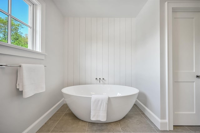 171 Compo Rd S, Westport, CT 06880 - bathroom featuring baseboards, a freestanding bath, and tile patterned flooring