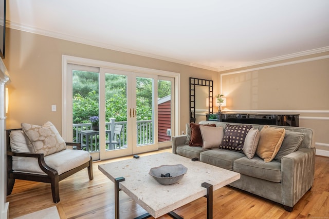 645 Prospect Ave Unit 9, West Hartford, CT 06105 - living room with crown molding, light wood-type flooring, and french doors