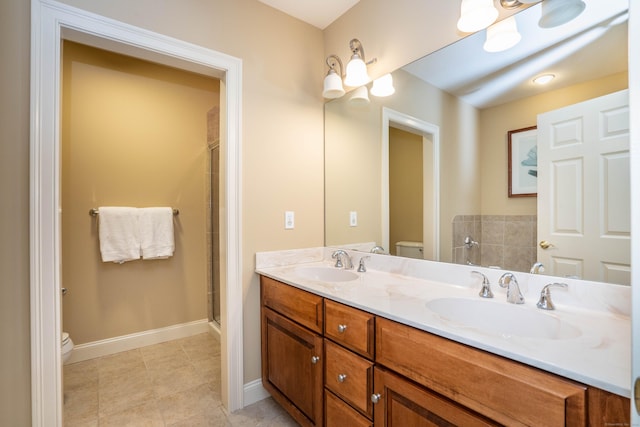 645 Prospect Ave Unit 9, West Hartford, CT 06105 - full bath with toilet, double vanity, tile patterned flooring, a shower with door, and baseboards