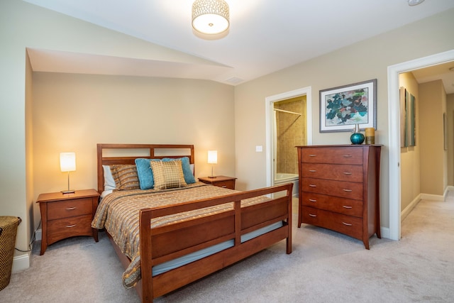 645 Prospect Ave Unit 9, West Hartford, CT 06105 - bedroom featuring light carpet, vaulted ceiling, and baseboards