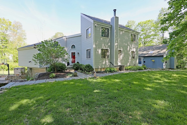 47 Old S Salem Road, Ridgefield, CT 06877 - view of front facade featuring a chimney and a front lawn