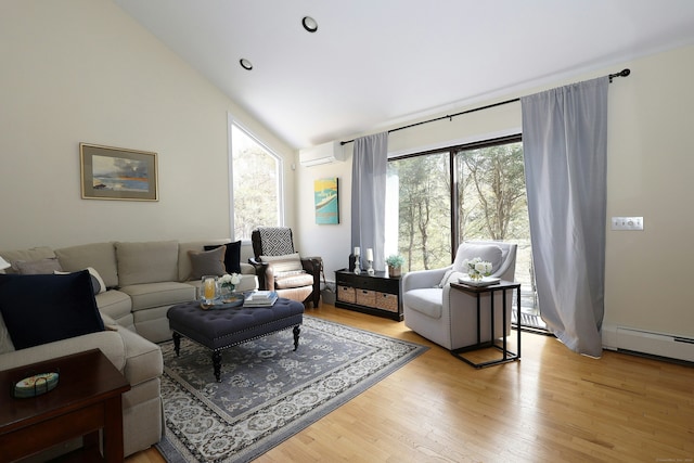 47 Old S Salem Road, Ridgefield, CT 06877 - living area with a wall mounted AC, vaulted ceiling, light wood-type flooring, and a baseboard heating unit