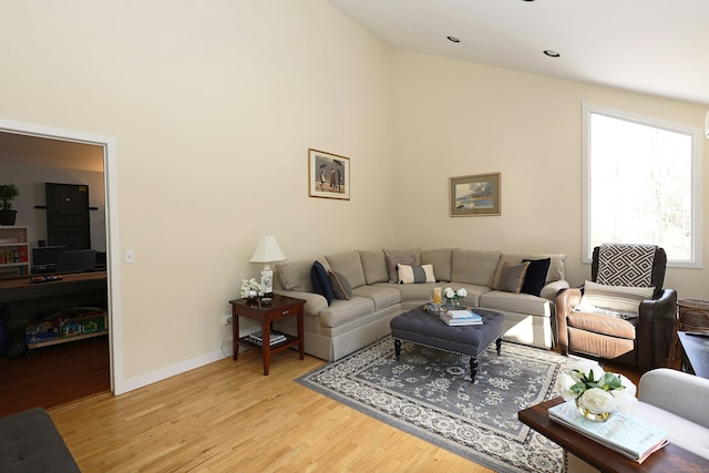 47 Old S Salem Road, Ridgefield, CT 06877 - living area with light wood finished floors, baseboards, and high vaulted ceiling