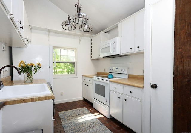47 Old S Salem Road, Ridgefield, CT 06877 - kitchen with white appliances, a sink, a chandelier, brick floors, and light countertops