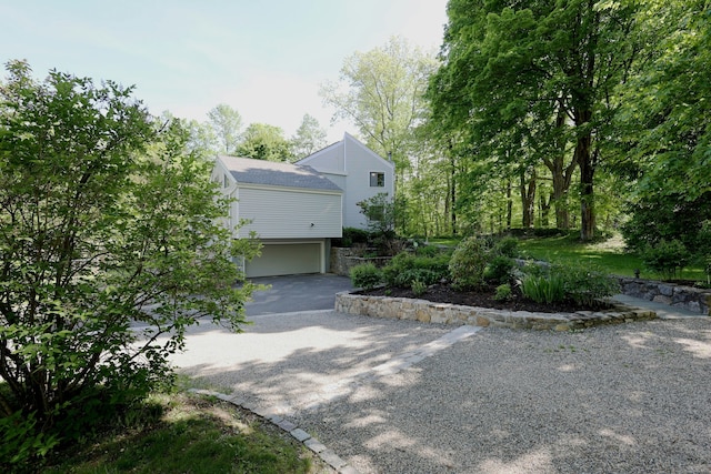 47 Old S Salem Road, Ridgefield, CT 06877 - view of front facade with an attached garage and driveway