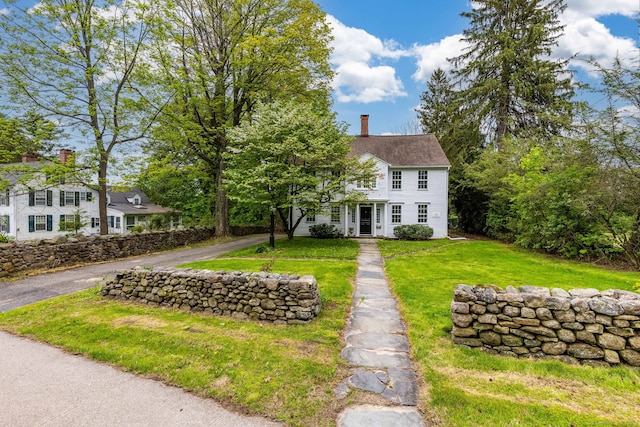 79 Deforest St, Watertown, CT 06795 - colonial home with a chimney and a front lawn
