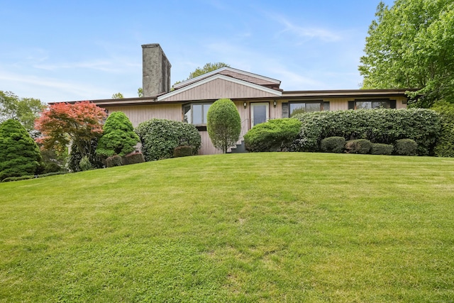 223 Sterling Rd, Trumbull, CT 06611 - view of front of house featuring a front lawn and a chimney