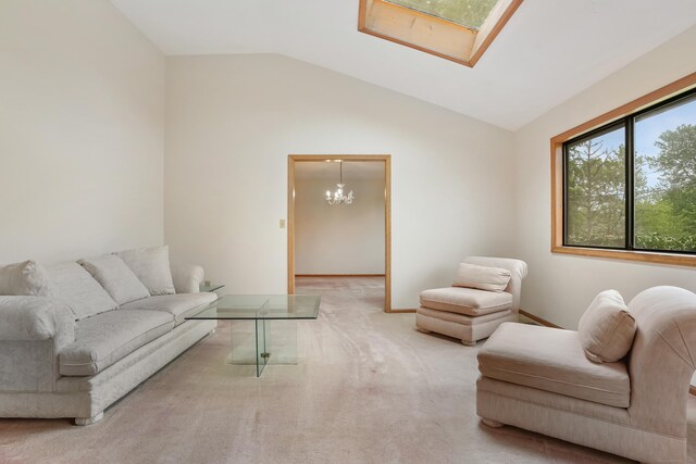 223 Sterling Rd, Trumbull, CT 06611 - carpeted living room with vaulted ceiling, a chandelier, a skylight, and baseboards