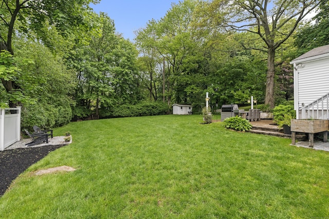 124 Killian Ave, Trumbull, CT 06611 - view of green lawn featuring a deck