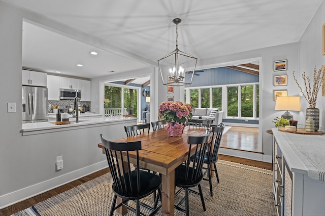 124 Killian Ave, Trumbull, CT 06611 - dining area with dark wood-type flooring, a chandelier, baseboards, and recessed lighting