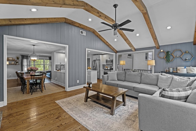 124 Killian Ave, Trumbull, CT 06611 - living room with hardwood / wood-style flooring, ceiling fan, baseboards, wood walls, and recessed lighting