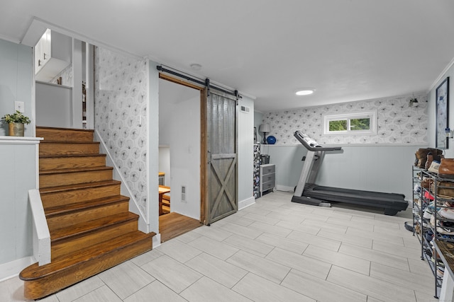 124 Killian Ave, Trumbull, CT 06611 - exercise room featuring a barn door, wallpapered walls, and a wainscoted wall