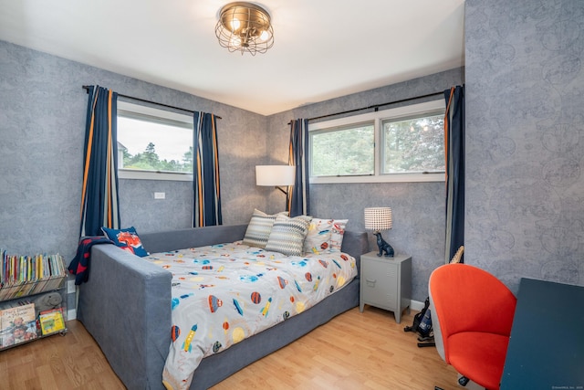 31 Westcliff Dr, West Hartford, CT 06117 - bedroom with multiple windows and wood finished floors